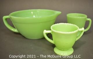 Three (3) Pieces of Vintage Green Jadeite Glassware.  Includes Fire King Mixing Bowl Pitcher With Handle and Mug and Mckee Laurel Double Handle Sugar Bowl.