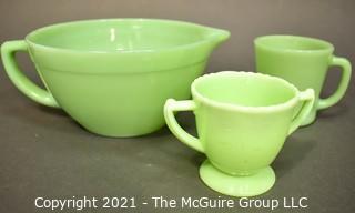 Three (3) Pieces of Vintage Green Jadeite Glassware.  Includes Fire King Mixing Bowl Pitcher With Handle and Mug and Mckee Laurel Double Handle Sugar Bowl.