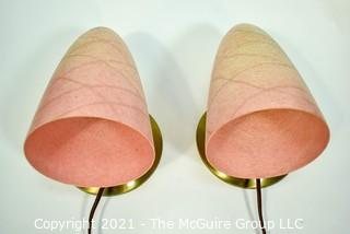 Pair of Vintage Mid Century Modern Pink Wall Mount Lamps with Fiberglass Cone or Bullet Shaped Shades.   Each measure 8" long.