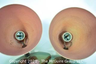 Pair of Vintage Mid Century Modern Pink Wall Mount Lamps with Fiberglass Cone or Bullet Shaped Shades.   Each measure 8" long.