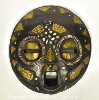 Round Wood Hand Carved & Painted Tribal Mask, Ethnographic. Measures 12" in diameter.