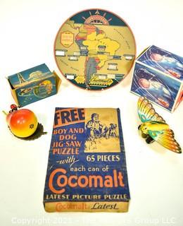 Group of Vintage Toys.  Includes Wooden Pear Savings Bank, Cocomalt Premium Giveaway Jigsaw Puzzle (Has not been completed), Charlomap Turn and Learn Game Cover and Two EMPTY Toy Boxes/