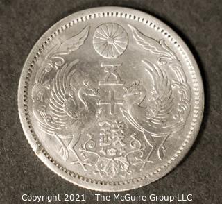 1922 - 1936 Japan Silver 50 Sen Double Phoenix, Silver content 72% Silver 28% Copper.