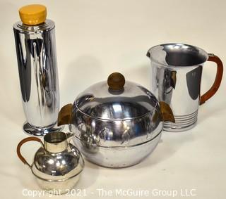 Collection of Mid Century Art Deco Style Chrome Barware.  Includes Chase Tall Cocktail Shaker With Butterscotch Bakelite Top, West Bend Penguin Hot & Cold Server, Bakelite Handled Pitcher and Small Pitcher with Wrapped Handle. 