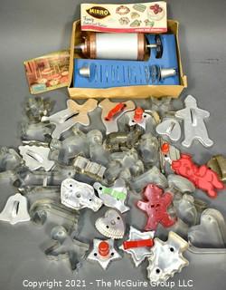 Group of Vintage Cookie Cutters and Mirro Cookie Press.  Includes Davis Baking Soda Promotionsal Biscuit Cutter. 