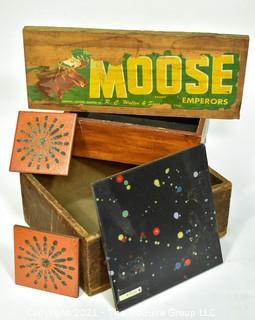 Vintage Ceramics Tiles, 2 Antique Wooden Boxes and Moose Brand Food Crate Label on Plank.