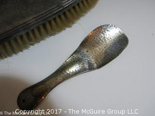 REVISED: 1 Vintage sterling covered brush; 1 silver plated brush, and a sterling shoe horn.  