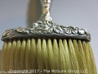 REVISED: 1 Vintage sterling covered brush; 1 silver plated brush, and a sterling shoe horn.  