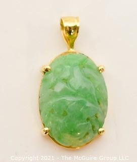 Carved Jade Pendant in 14kt Gold Surround and Chain. * 