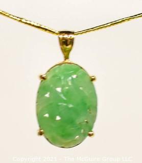 Carved Jade Pendant in 14kt Gold Surround and Chain. * 