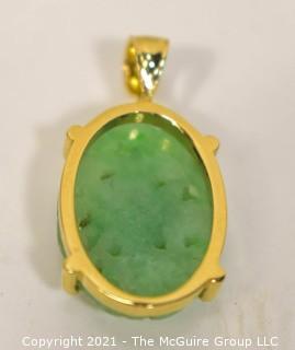 Carved Jade Pendant in 14kt Gold Surround and Chain. * 