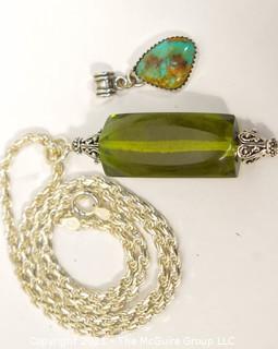 Two Gemstone Pendants Set in Sterling Silver Includes, Turqoise and Green Amber. 