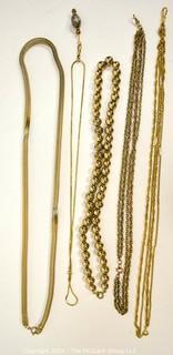 Five (5) Gold Tone Chain and Bead Necklaces. 