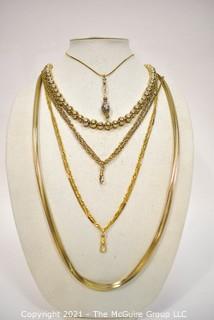 Five (5) Gold Tone Chain and Bead Necklaces. 