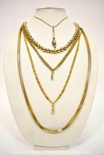 Five (5) Gold Tone Chain and Bead Necklaces. 