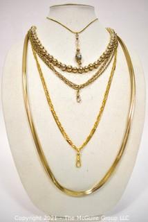 Five (5) Gold Tone Chain and Bead Necklaces. 