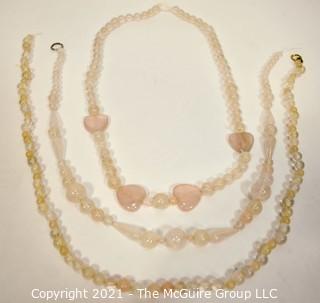 Three (3) Rose Quartz Stone Bead Necklaces.  They measure 18", 21" and 22".