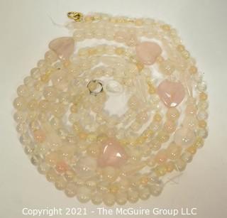 Three (3) Rose Quartz Stone Bead Necklaces.  They measure 18", 21" and 22".