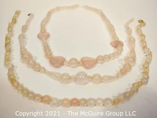 Three (3) Rose Quartz Stone Bead Necklaces.  They measure 18", 21" and 22".