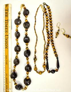 Group of Tigers Eye and Black Onyx Bead Necklaces and Earrings. 