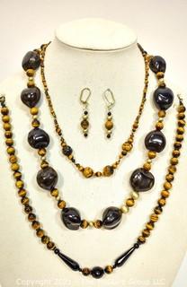 Group of Tigers Eye and Black Onyx Bead Necklaces and Earrings. 