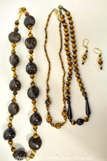 Group of Tigers Eye and Black Onyx Bead Necklaces and Earrings. 