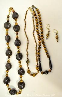 Group of Tigers Eye and Black Onyx Bead Necklaces and Earrings. 