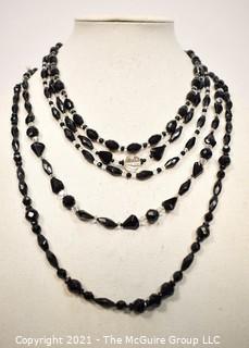 Facetted Clear and Black Glass Bead Necklaces. 