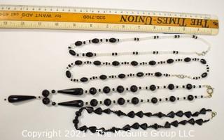 Group of Facetted Clear and Black Glass Bead Necklaces.  They measure 18", 20" & 21" long. 