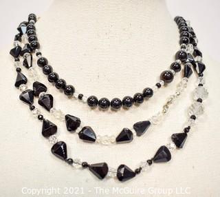 Three (3) Facetted Clear and Black Glass Bead Necklaces. 