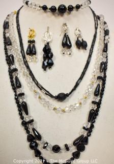 Group of Facetted Clear and Black Glass Bead Necklaces and Matching Earrings. 