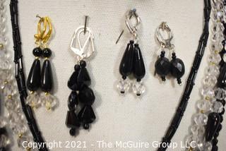 Group of Facetted Clear and Black Glass Bead Necklaces and Matching Earrings. 