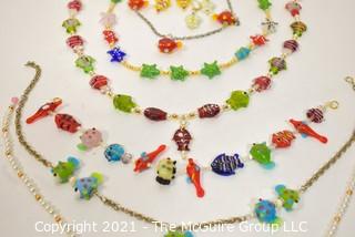 Group of Blown Glass Beads with Fish and Starfish