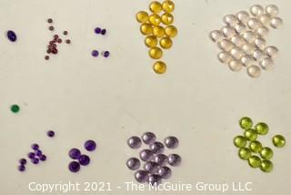 Group of Loose Oval Gemstone Cabochon Flat Back Gemstones. Includes Amethysts, Garnets, Citrine, Rose Quarts, Peridot and Emerald. 