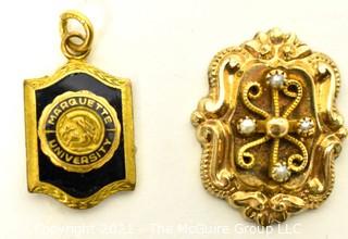 Two (2) Vintage 14kt Gold Pendants Including Marquette University.  