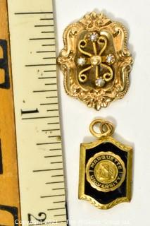 Two (2) Vintage 14kt Gold Pendants Including Marquette University.  