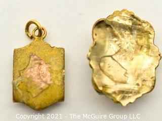 Two (2) Vintage 14kt Gold Pendants Including Marquette University.  