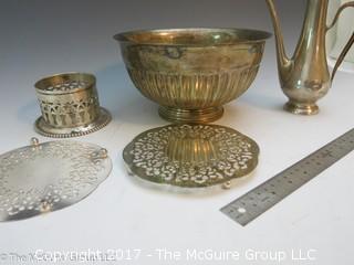 Collection of silverplated holloware including large bowl, trivets, and hallmarked tea pot