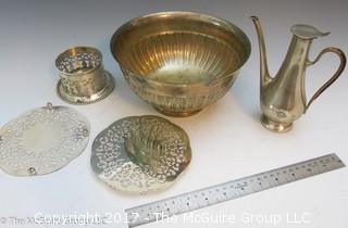 Collection of silverplated holloware including large bowl, trivets, and hallmarked tea pot