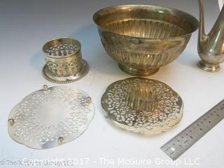 Collection of silverplated holloware including large bowl, trivets, and hallmarked tea pot