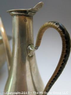 Collection of silverplated holloware including large bowl, trivets, and hallmarked tea pot