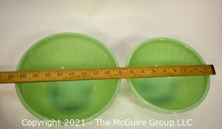 Two (2) Green Jadeite Fire King Swirl Mixing Bowls.  They measure 8" x 10" in diameter.