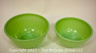 Two (2) Green Jadeite Fire King Swirl Mixing Bowls.  They measure 8" x 10" in diameter.