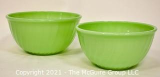 Two (2) Green Jadeite Fire King Swirl Mixing Bowls.  They measure 8" x 10" in diameter.