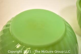 Two (2) Green Jadeite Fire King Swirl Mixing Bowls.  They measure 8" x 10" in diameter.