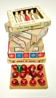 Seven (7) Boxes of Mini Shiny Brite Glass Ball Ornaments.  Includes Tear Drops. One is missing box top. 