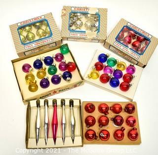 Seven (7) Boxes of Mini Shiny Brite Glass Ball Ornaments.  Includes Tear Drops. One is missing box top. 