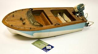 Vintage 1950s Chris Craft Speedboat Model with Plastic Hull and Buccaneer Battery Operated Boat Motor. *