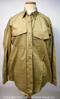 US Marine Corps tan khaki clothing: 4 long sleeve shirts, 5 short sleeved shirts and 4 pair of trousers