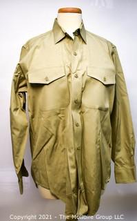 US Marine Corps tan khaki clothing: 4 long sleeve shirts, 5 short sleeved shirts and 4 pair of trousers